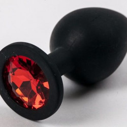 Черная силиконовая анальная пробка с красным стразом - 8,2 см.